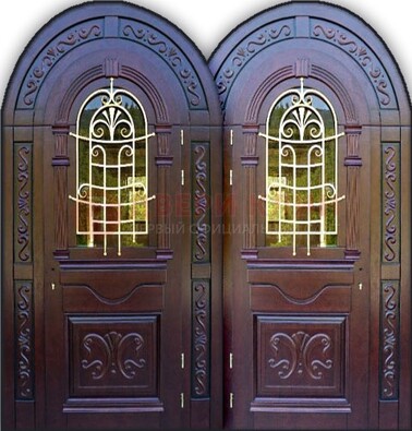 Индивидуальная арочная дверь со стеклом и ковкой ДА-19 в Мурманске