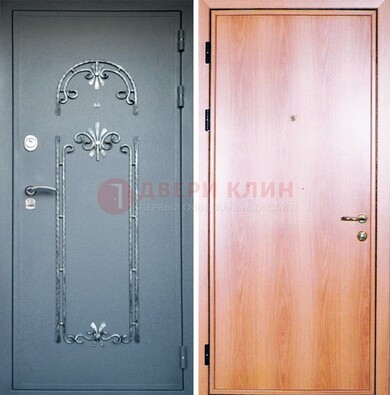 Железная дверь с ковкой ламинат внутри ДК-11 в квартиру в Мурманске