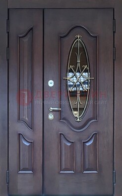 Темная металлическая дверь Винорит со стеклом и ковкой ДСК-239 в Мурманске
