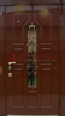 Красивая металлическая дверь со стеклом и ковкой ДСК-33 в Мурманске