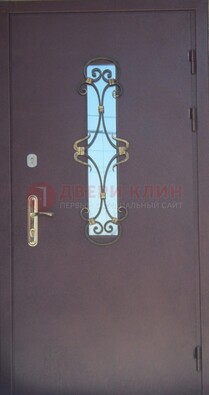 Металлическая дверь со стеклом и ковкой ДСК-77 в Мурманске