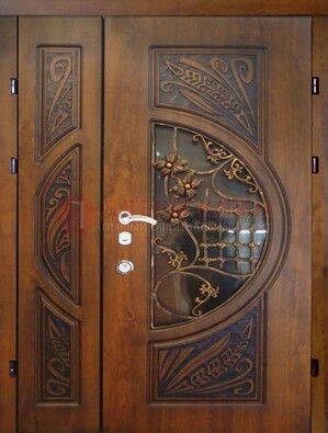 Металлическая дверь с виноритом и резной панелью внутри ДВТ-70 в Мурманске