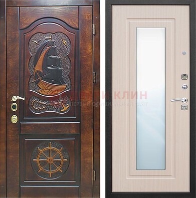 Темная дверь с резьбой и зеркалом внутри ДЗ-49 в Мурманске